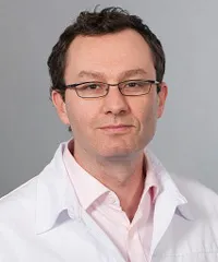 Dr Thibaud Kössler