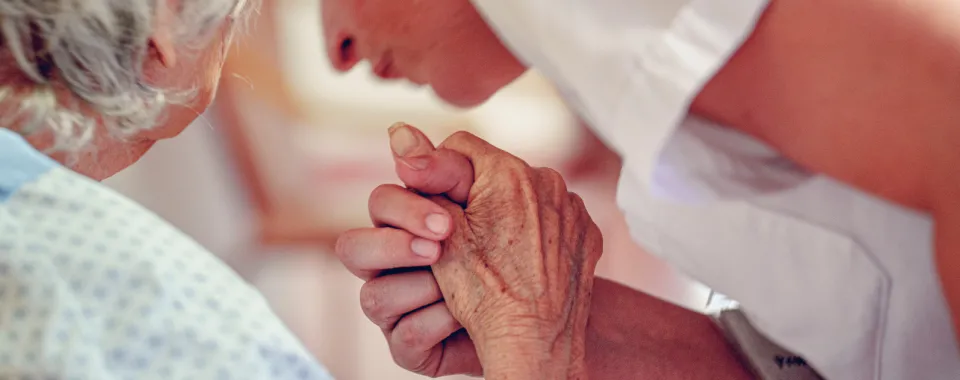 Soignant et patient - Copyright : David Wagnières - HUG
