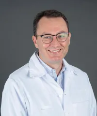 Dr  Thibaud  Kössler